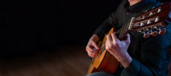 Guitarist,Male,Hands,Playing,The,Guitar.,Classical,Concert,,Performance,Rehearsal,